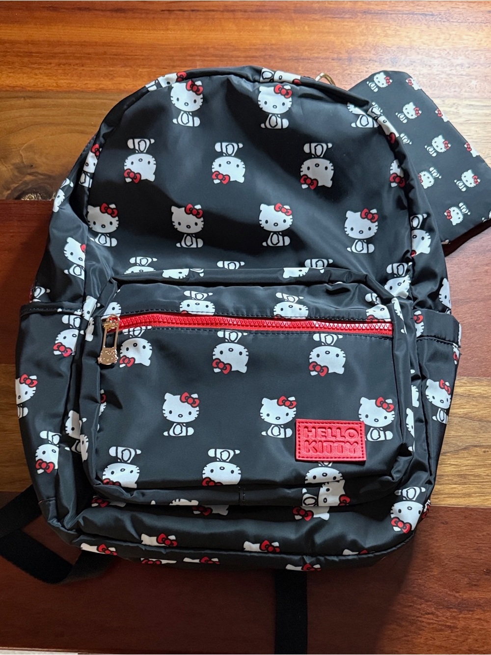 Hello Kitty Black Backpack with White Character Print and Red Accents
